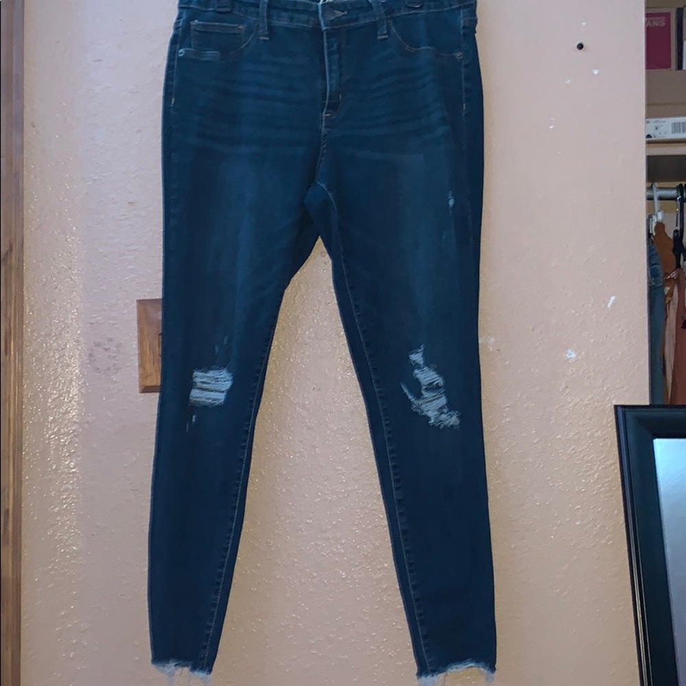 Ripped blue jeans
